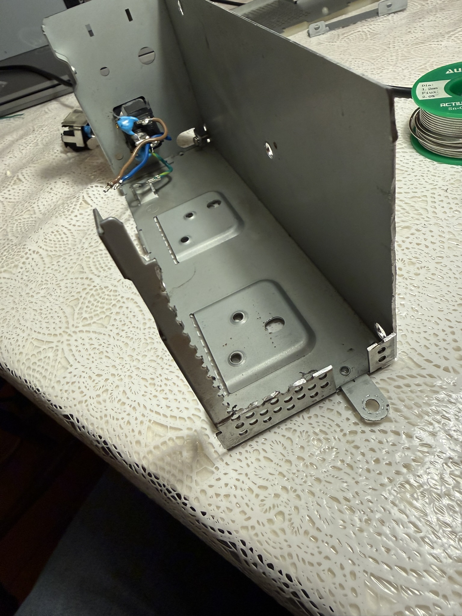 The original PSU case and horrible dremel based rework