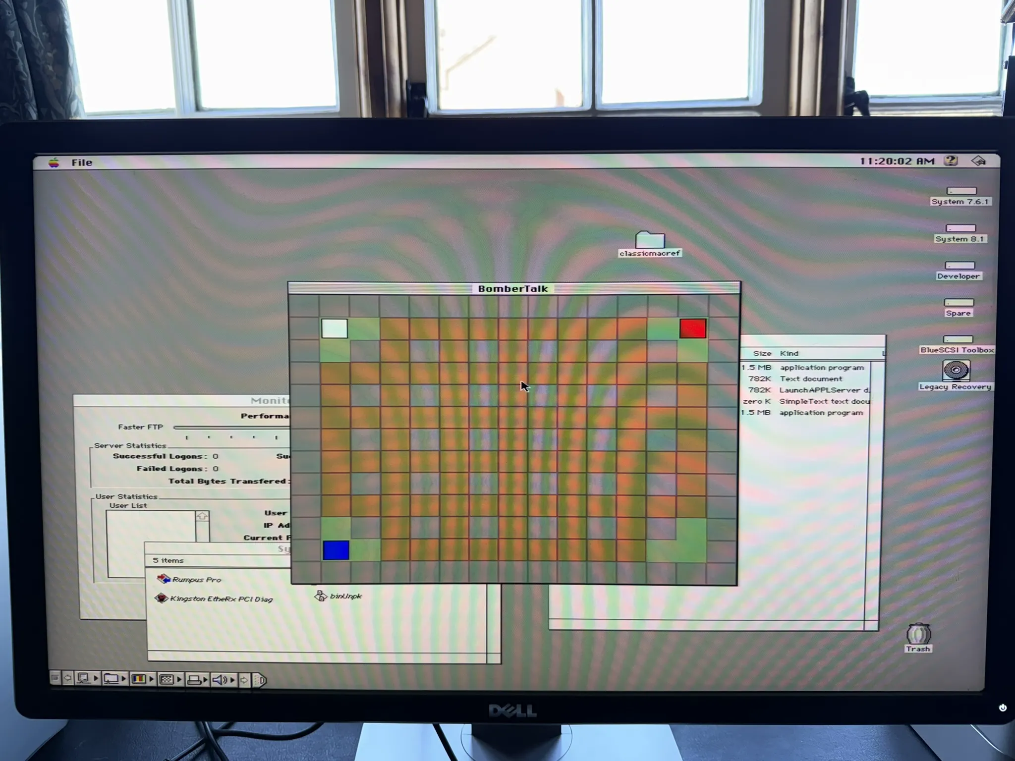 Performa 6400 running BomberTalk in-game showing coloured player blocks on a grid