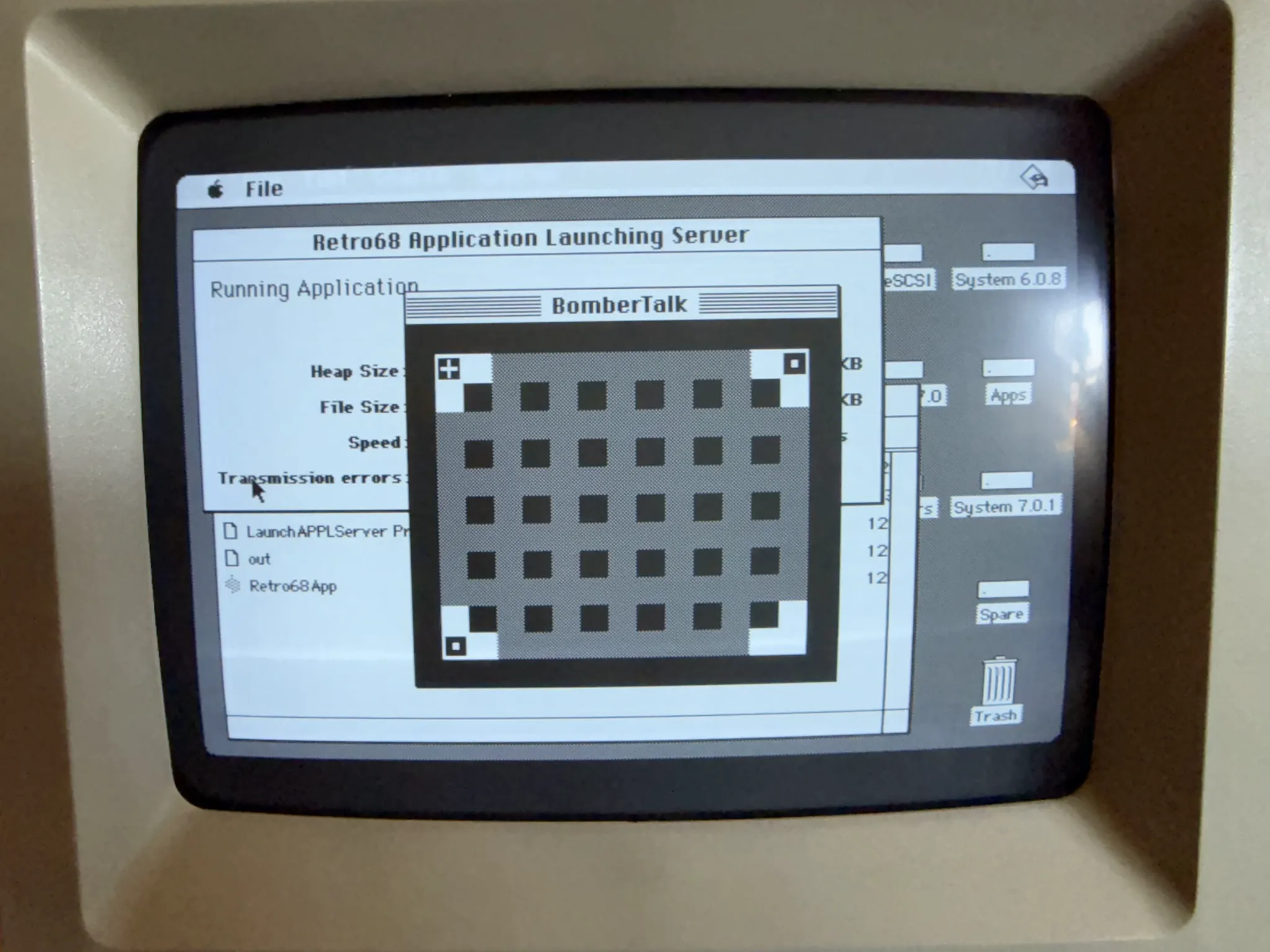 Mac SE running BomberTalk in monochrome