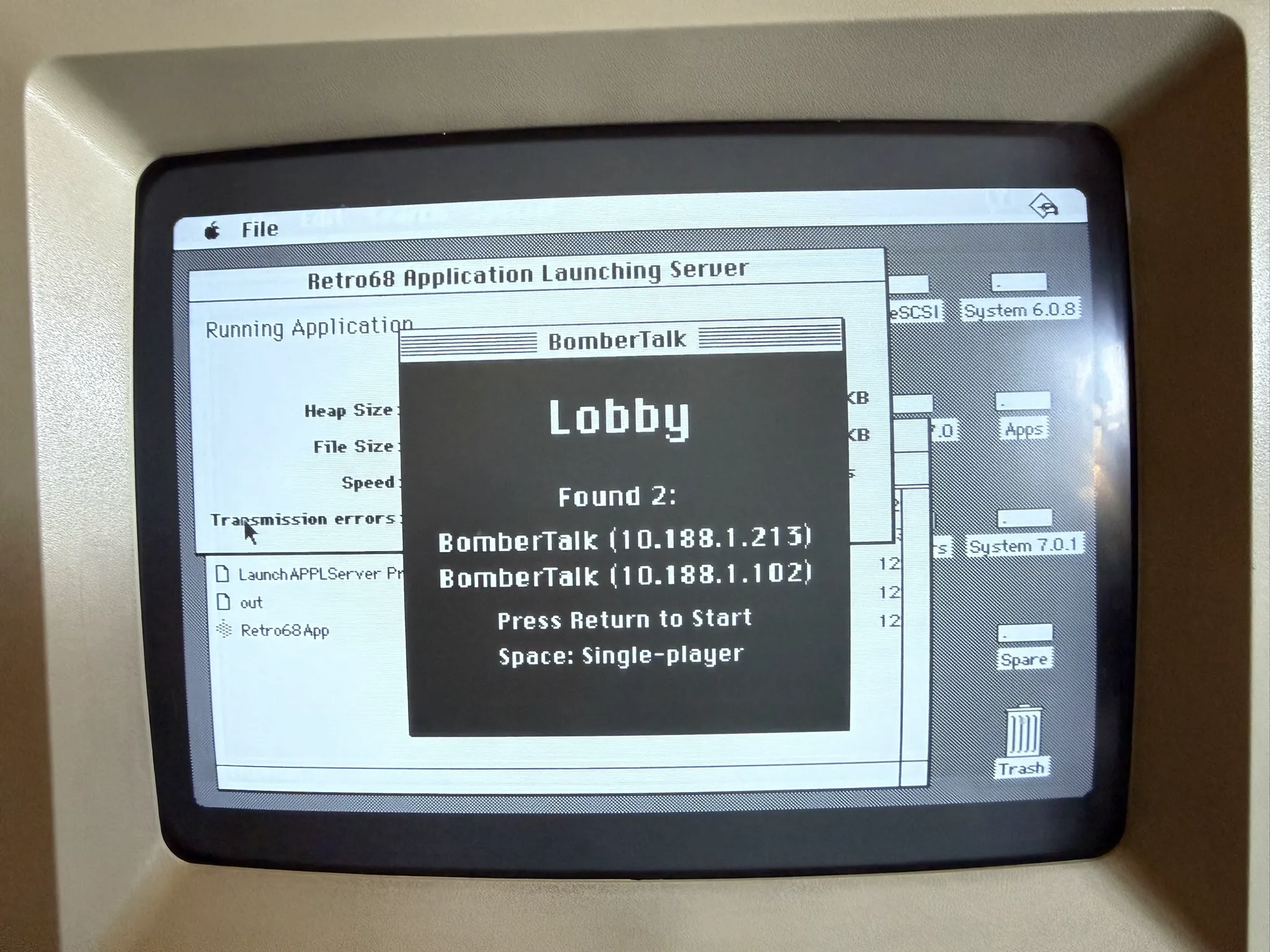 Mac SE running BomberTalk lobby showing two discovered peers