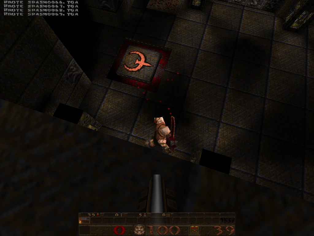 QuakeSpasm on mini-g4, a 2005 Mac mini G4 with a Radeon 9200 — overhead view of an Ogre with chainsaw and visible alias-model shadow