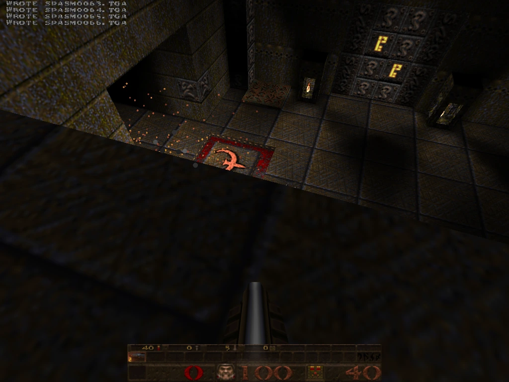 QuakeSpasm on quicksilver, a 2001 PowerMac G4 with a Radeon 9000 — slipgate hub with sparks, Q-rune floor, glowing E sigils