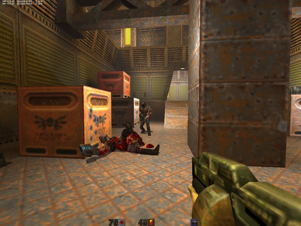 mini-g4, gibbed soldier in a crate-strewn hangar with a Strogg in the doorway