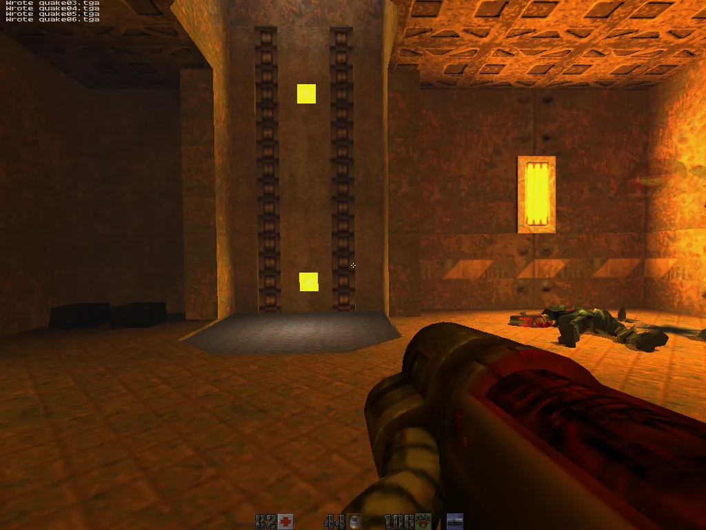 mini-intel, yellow elevator lights on a brown door, dead Strogg slumped on the floor