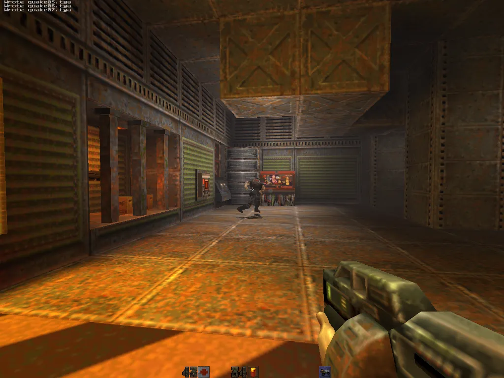 sawtooth, Strogg running across a warmly lit corridor floor in a yellow-tinted hallway