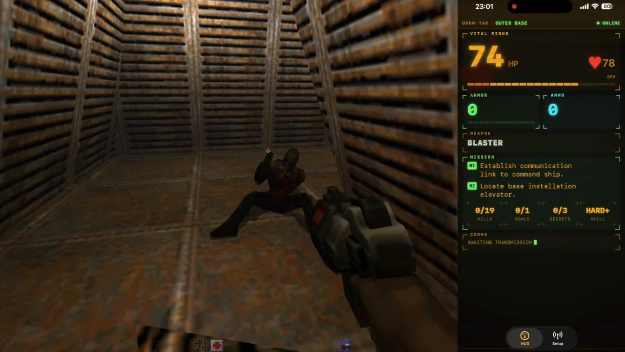 Quake II on screen with the iPhone HUD in portrait reading 74 HP, mission objectives and a comms ticker